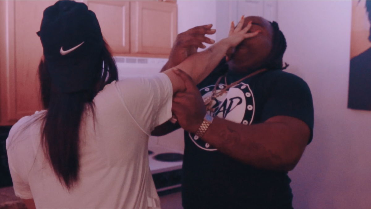 SMILE music video still - kitchen scene